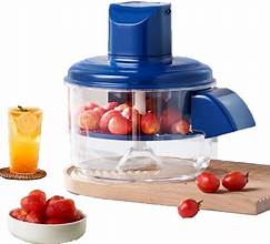 Automatic small fruit peeler machine by Rabiya Mart with stainless steel components and ergonomic design for efficient peeling.